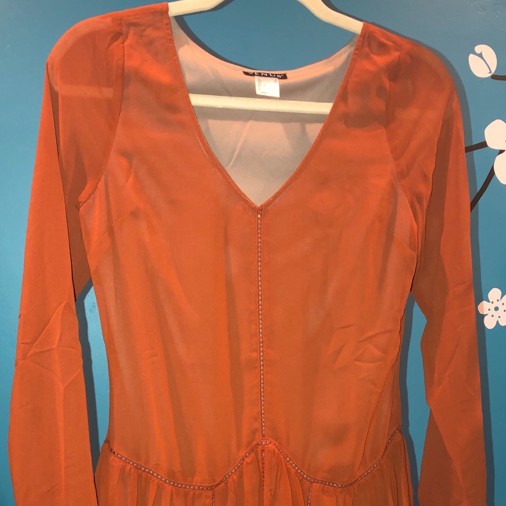 burnt orange flowy dress with a v-neck